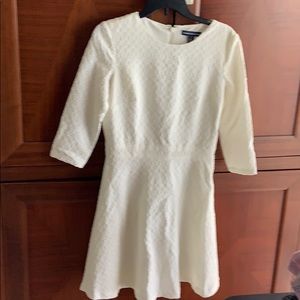 Flattering slightly off white dress, with lining